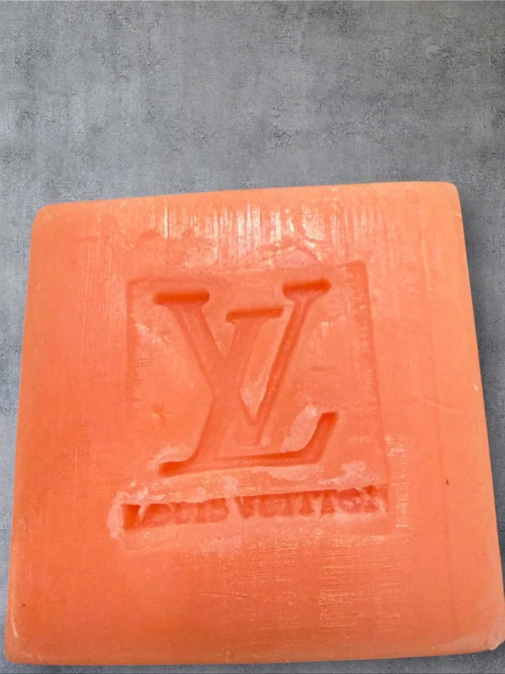 NWOT Coral-Orange Embossed Cleansing Bar